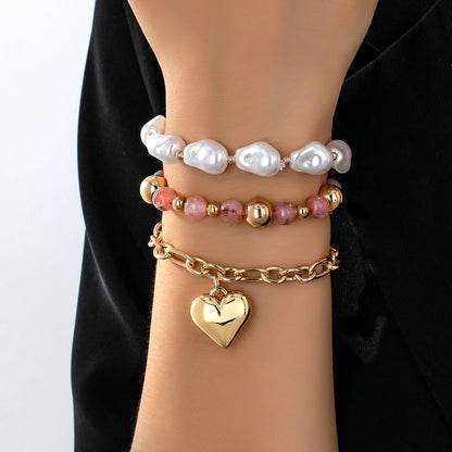 JOSSLYN by wall to wall - MULTI LAYER MIXED PEARL BEAD HEART CHARM BRACELET | 80B1549