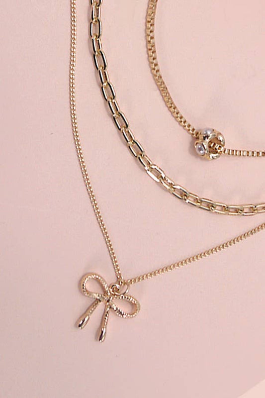 JOSSLYN by wall to wall - MULTI LAYER PEARL BOW CHARM NECKLACE | 80N605