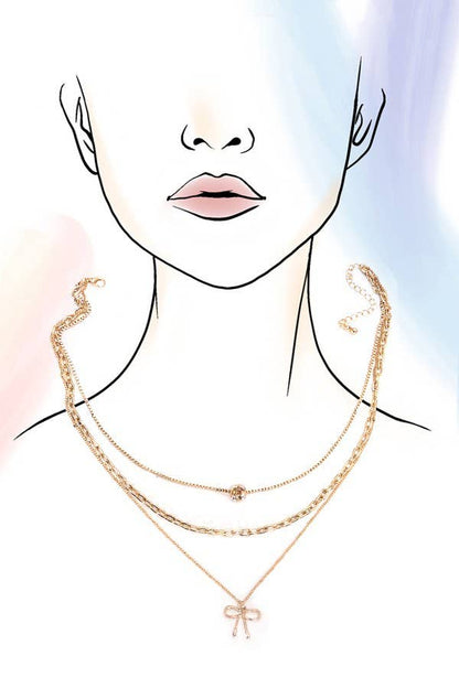 JOSSLYN by wall to wall - MULTI LAYER PEARL BOW CHARM NECKLACE | 80N605