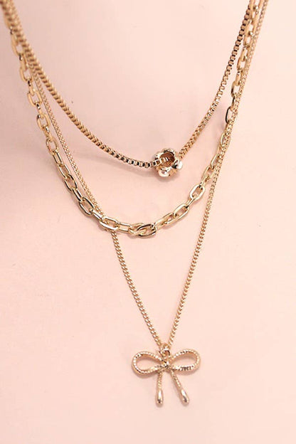 JOSSLYN by wall to wall - MULTI LAYER PEARL BOW CHARM NECKLACE | 80N605